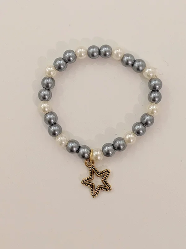 دستبند ستاره نقره ای سفید
